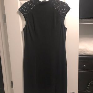 Joseph Ribkoff black sheath dress with metal detail on shoulders